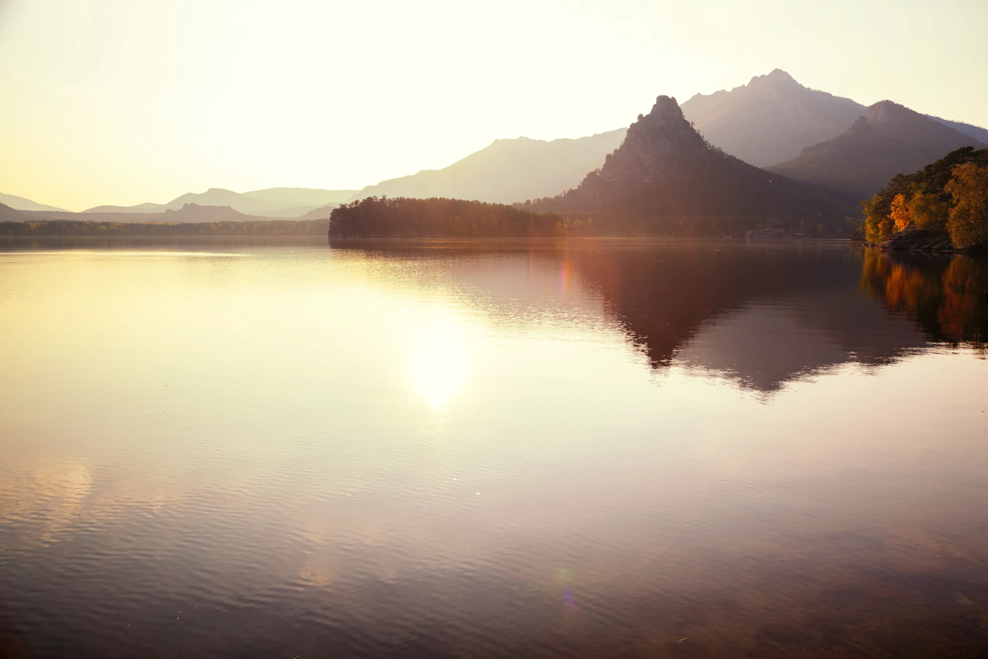 Silhouette of cliff Okzhetpes at sunset in Natonal park Burabay (Borovoe), Kazakhstan