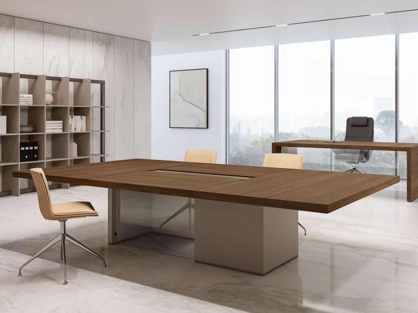 About Office
MAGNUM
Rectangular wooden meeting table with electrical outlets
