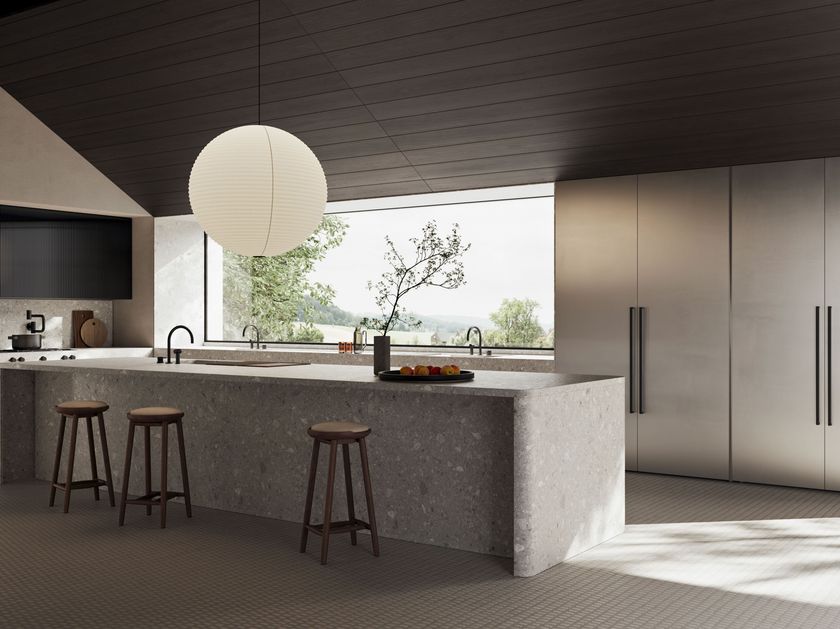 DelTongo
CO.06
Kitchen with an island in metallic lacquer with rounded sides