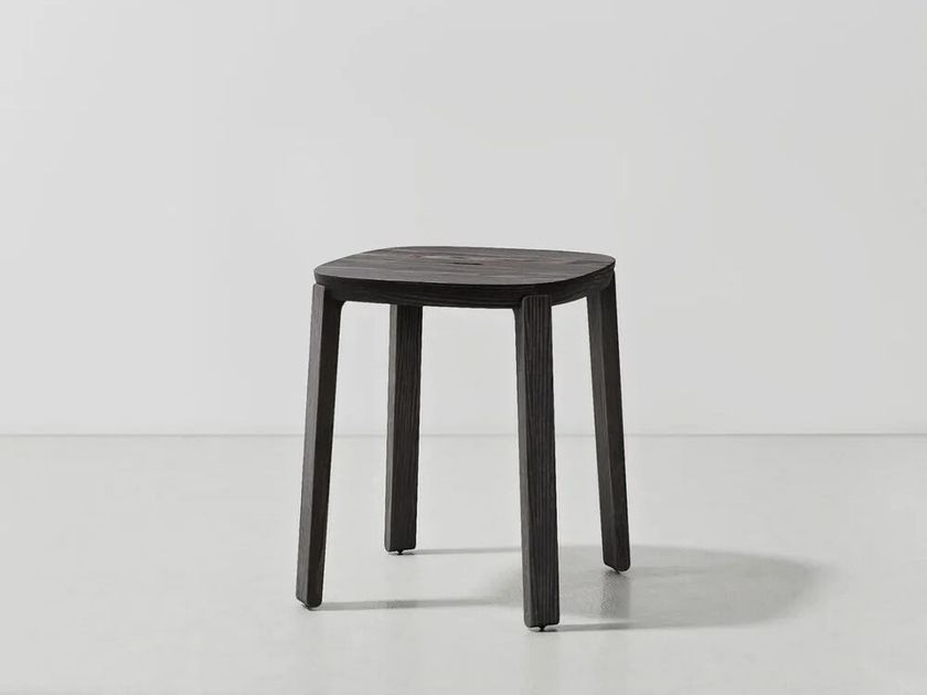 District Eight
COLLETTE
Backless low wooden stool