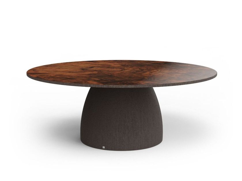 GANSK
BARREL
Round fiberglass table with walnut root top