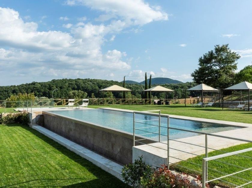 INDALO PISCINE
TREQUANDA
Infinity Semi Inground swimming pool with waterfall