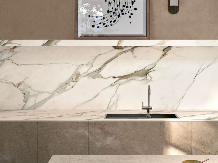Optimum Surfaces
CALACATTA GOLD
Porcelain stoneware wall tiles with marble effect