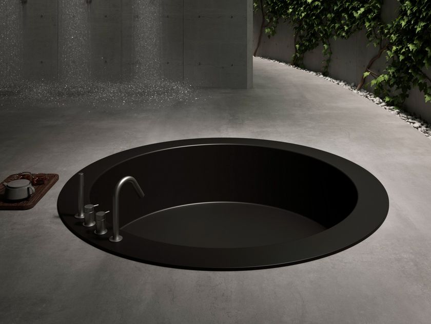 Rexa
ROTONDA MAXI
Round built-in Corian® bathtub