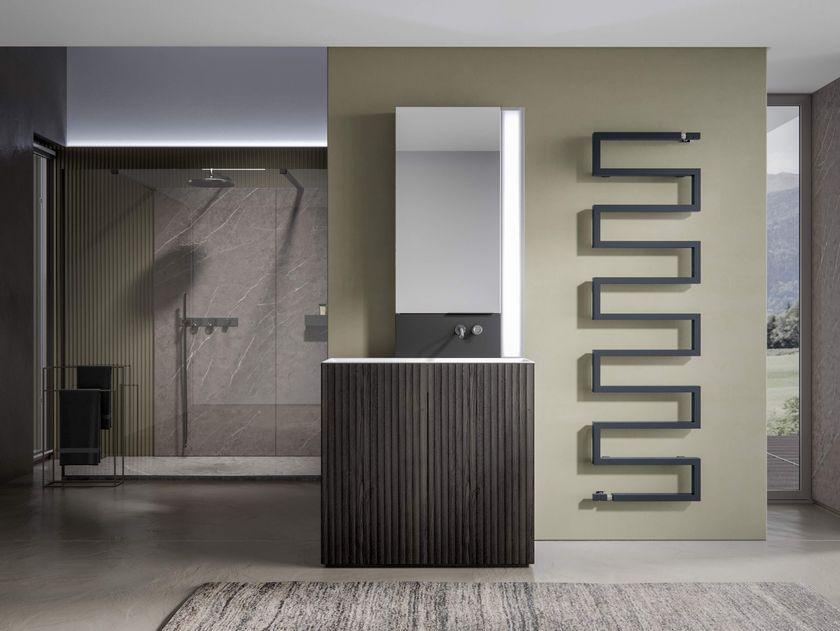 SCIROCCO H
SNAKE ONE
Wall-mounted steel towel warmer