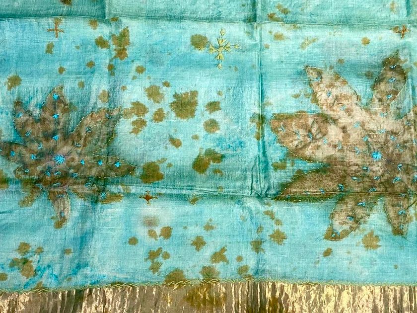 Tohora
TUSSAR SILK GOLDEN FOLIAGE ON TURQUOISE
Handmade silk fabric