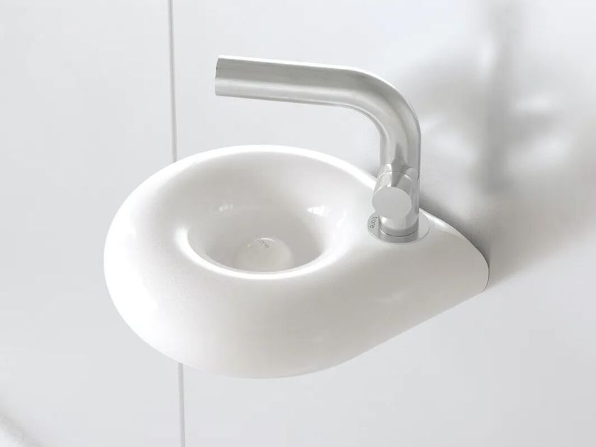 Trone
ORBE WHITE
Countertop or wall-mounted ceramic handrinse basin