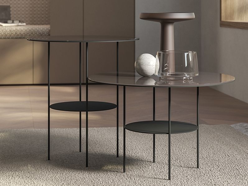 TUMIDEI
STICK
Round lacquered glass coffee table